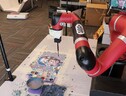 Il braccio robotico Frida all’opera (fonte: Carnegie Mellon University) (ANSA)