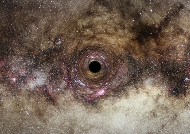 Rappresentazione artistica di un buco nero (fonte: ESA/Hubble, Digitized Sky Survey, Nick Risinger (skysurvey.org), N. Bartmann) © Ansa