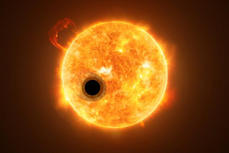 Rappresentazione artistica dell 'esopianeta WASP-107b e della sua stella, WASP-107 (fonte:  ESA / Hubble, NASA, M. Kornmesser) - RIPRODUZIONE RISERVATA