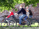 Bimbi nei rimorchi di bici respirano più smog di chi pedala (ANSA)