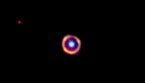 La galassia distante 12 miliardi di anni luce, in falsi colori. In arancione, le molecole complesse (fonte: J. Spilker / S. Doyle, NASA, ESA, CSA) (ANSA)