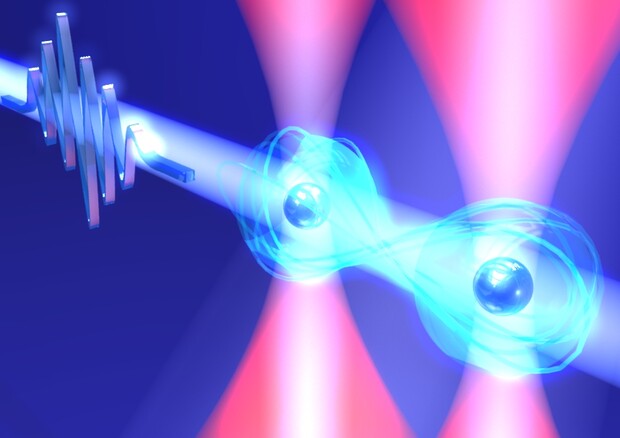 Rappresentazione artistica di due atomi di rubidio raffreddati quasi fino allo zero assoluto e manipolati con un impulso di luce laser di 10 picosecondi (fonte: Dr. Takafumi Tomita/IMS) © Ansa