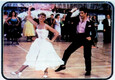 John Travolta e Olivia Newton John sulla locandina di Grease © 