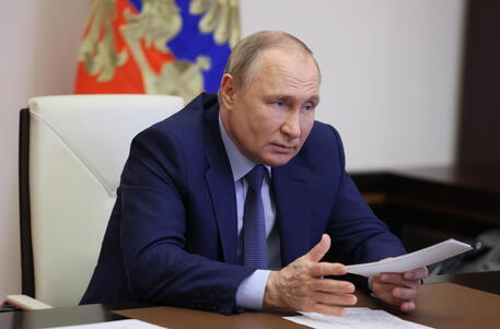 Russian President Vladimir Putin chairs a meeting on economic issues © EPA