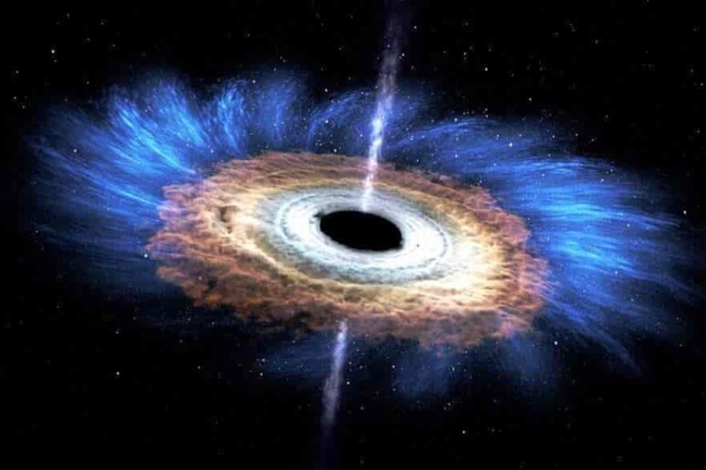 Raffigurazione di un buco nero simile al misterioso Cygnus X-1, la cui massa sembra il 50% maggiore delle attese. (fonte: NASA/NASA 's Goddard Space Flight Center). - RIPRODUZIONE RISERVATA